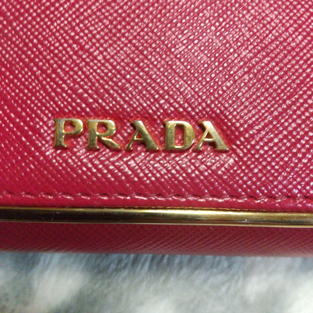 PRADA サフィアーノメタルラインレッド系 長財布