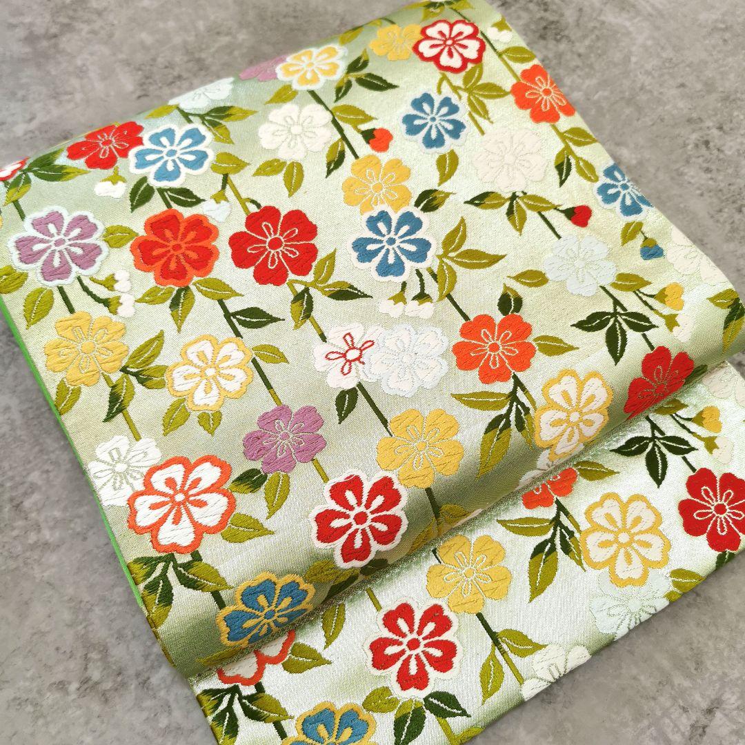 【お花畑】レアなグリーン カラフルお花畑な 贅沢 唐織 袋帯