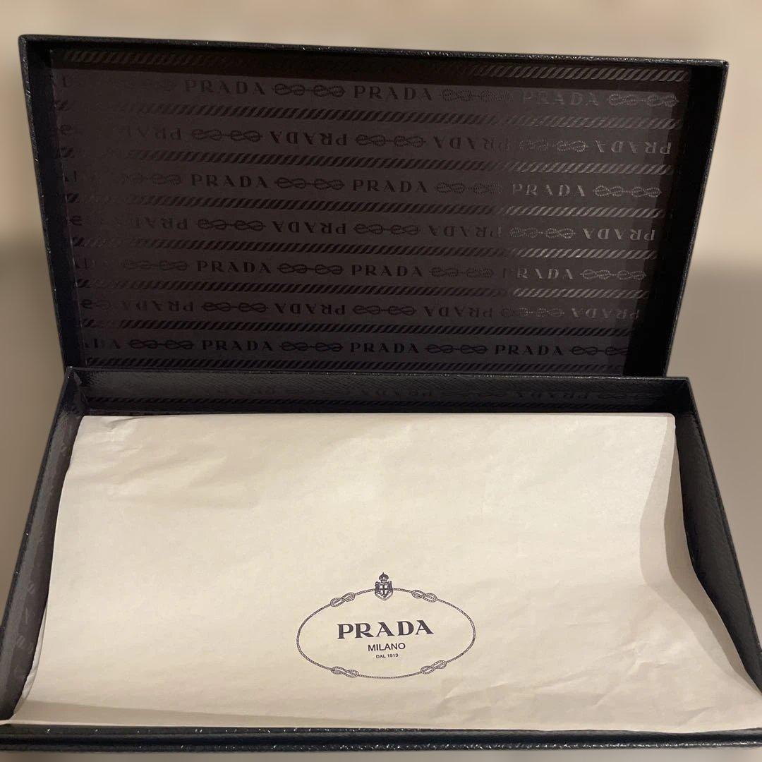 ◉PRADA プラダ　長財布 サフィアーノ　レザー リボン グレー