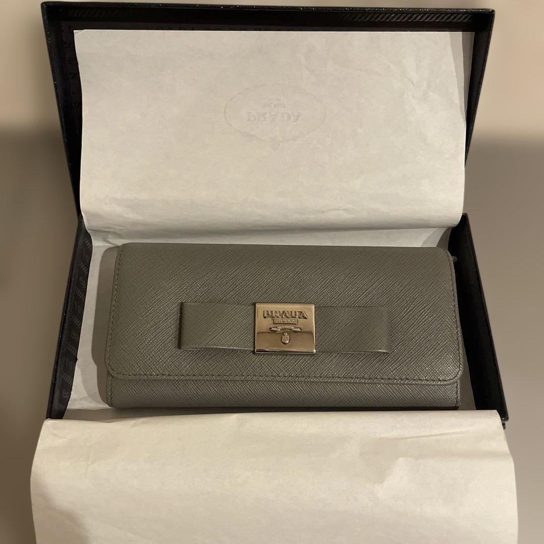 ◉PRADA プラダ　長財布 サフィアーノ　レザー リボン グレー