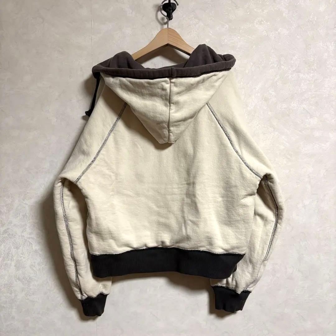 トップス FUMIKA_UCHIDA 2-TONE PULLOVER HOODIE