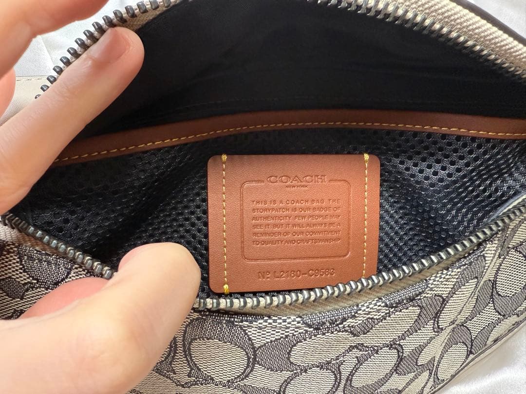 COACH コーチ リーグベルトバッグ ジャガード シグネチャー